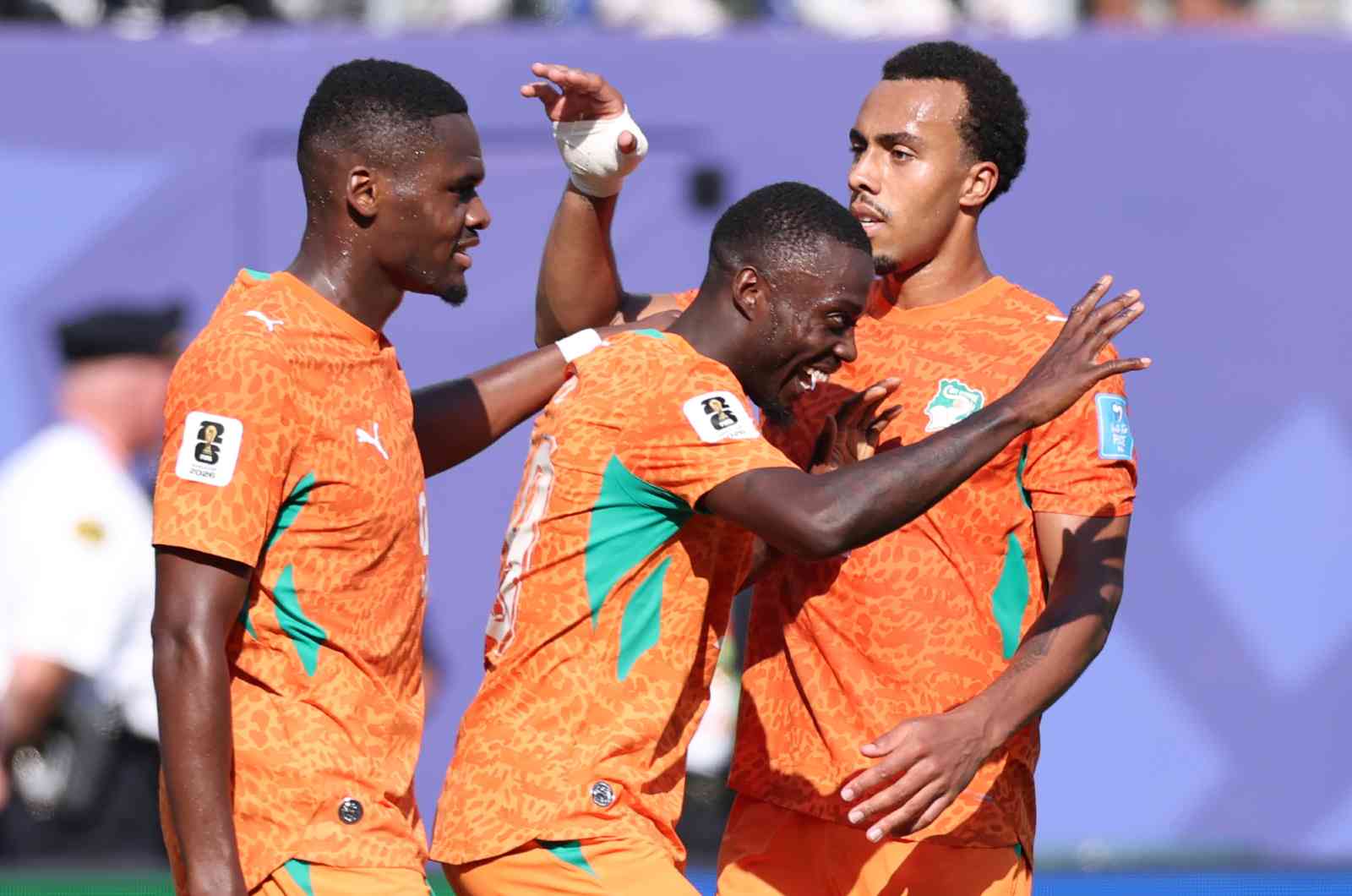 PHILADELPHIA, PENNSYLVANIA - JUNE 25: Nicolas Pepe #19 of Cote d'Ivoire celebrates with teammates Ange-Yoan Bonny #9 and Guela Doue #17 after scoring his team's second goal during the FIFA World Cup 2026 Group E match between Curacao and Cote D'Ivoire at Philadelphia Stadium on June 25, 2026 in Philadelphia, Pennsylvania.