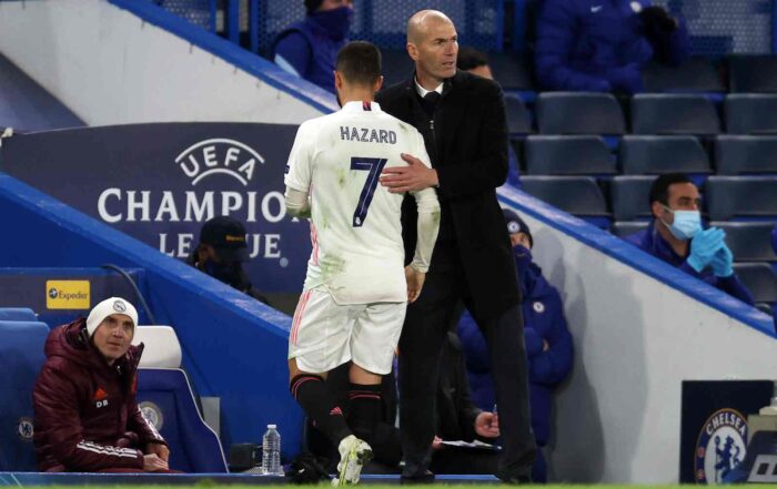 LONDON, ENGLAND - MAY 05: Eden Hazard of Real Madrid interacts with Zinedine Zidane, Head Coach of Real Madrid as he leaves the pitch during the UEFA Champions League Semi Final Second Leg match between Chelsea and Real Madrid at Stamford Bridge on May 05, 2021 in London, England. Sporting stadiums around Europe remain under strict restrictions due to the Coronavirus Pandemic as Government social distancing laws prohibit fans inside venues resulting in games being played behind closed doors.